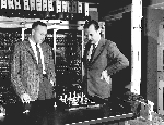 Los Alamos scientisits Paul Stern (left) and Nick Metropolis playing chess with the MANIAC computer