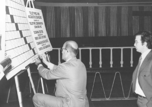 Mittman at scoreboard at 2nd ACM North American Computer Chess Championship in Chicago, Illinois