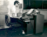 Rand employee Nelson G. Lucas at JOSS console